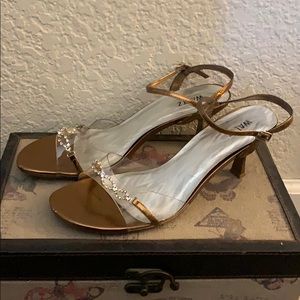 1 pair of heels, 1 pair or dressy sandals included
